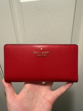 kate spade red continental wallet with gold logo